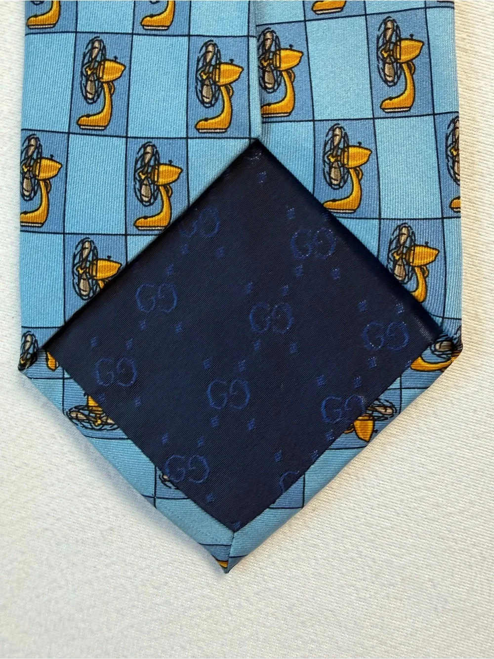 Gucci silk tie w/ electric fan pattern, blue/yellow, 54” 3.25”, GUC